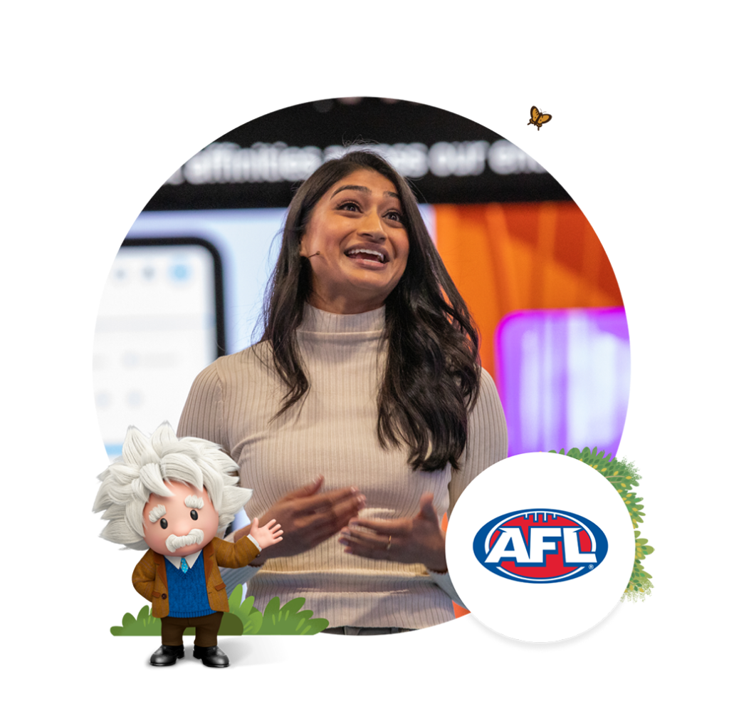 Woman presenting at an event, with the AFL logo visible