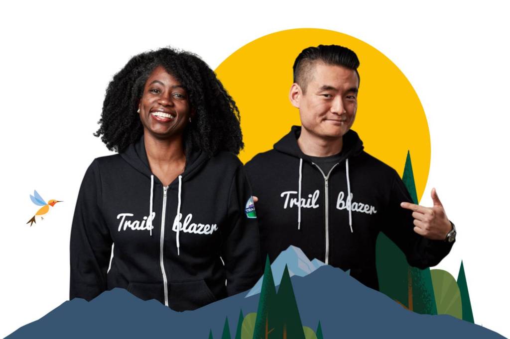 Two people wearing Trailblazer hoodies