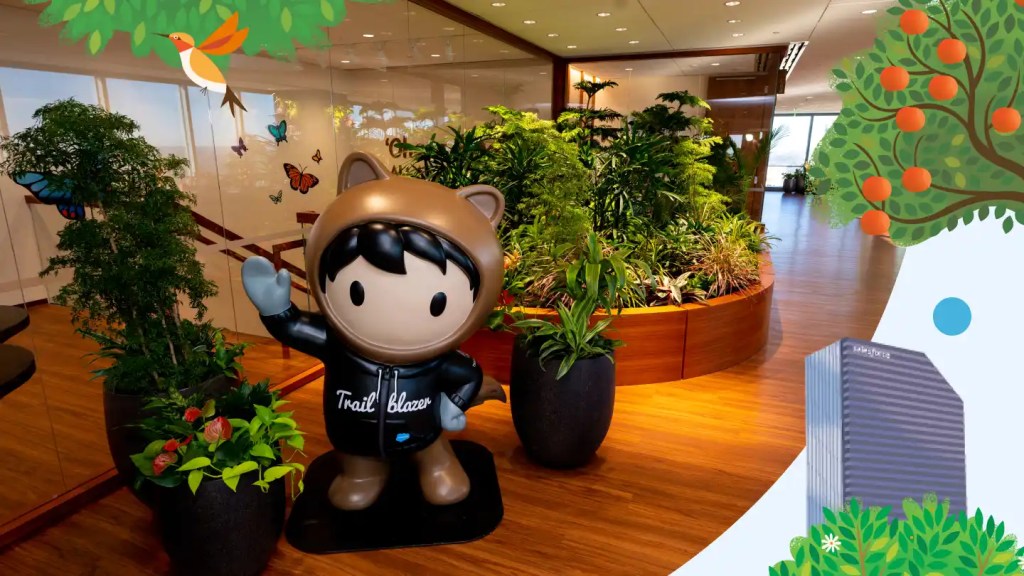 Astro, a Salesforce mascot, welcomes guests to the Atlanta Ohana Floor. 