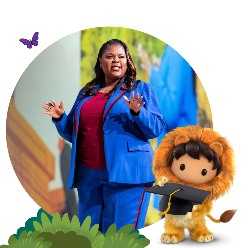 Education Summit presenter with Astro in a lion's suit holding a graduation cap