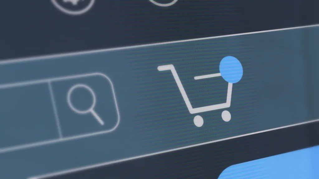 Icona di un carrello degli acquisti in primo piano su uno schermo digitale.